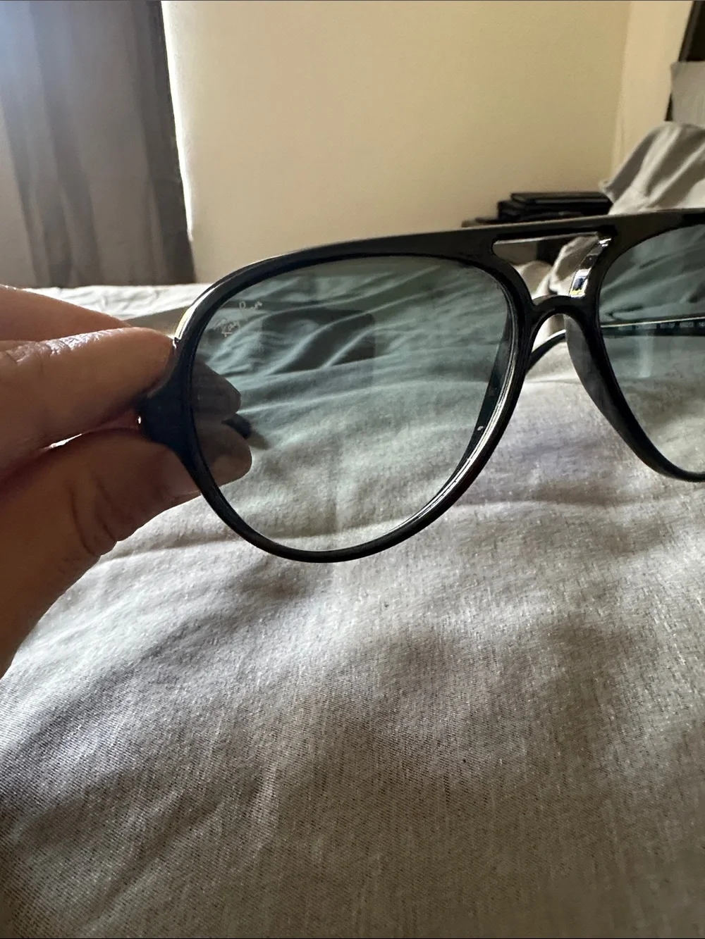 Ray-Ban Black Frame Sunglasses with Blue Tinted Lenses